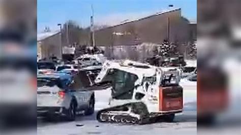 skid steer street fight|WATCH: Man rams vehicles at Home Depot with a skid loader.